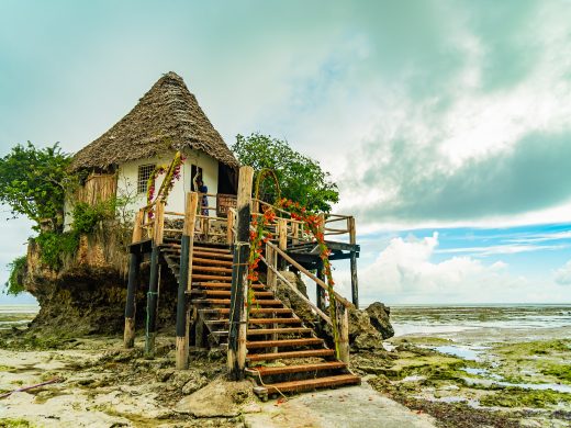 The Rocks restaurant on the beach during low tide. Pingwe, Zanzibar, Tanzania