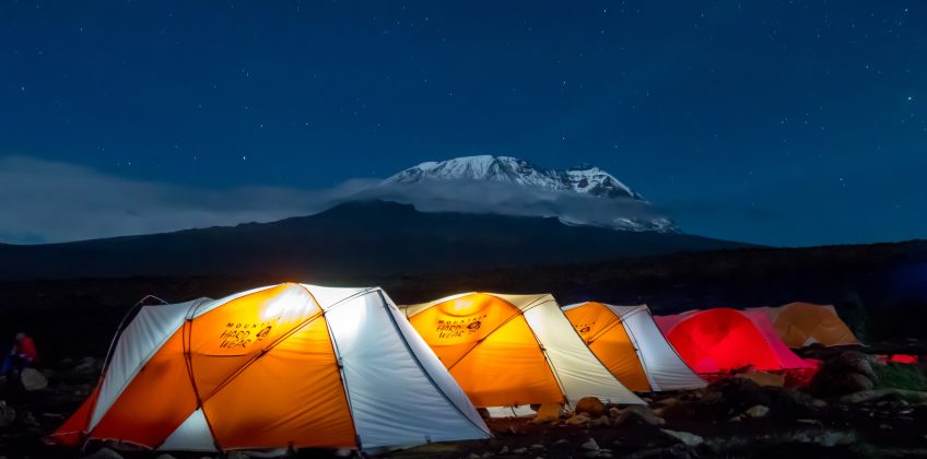 Orange,Tents,Illuminated,Before,Mount,Kilimanjaro,During,Night